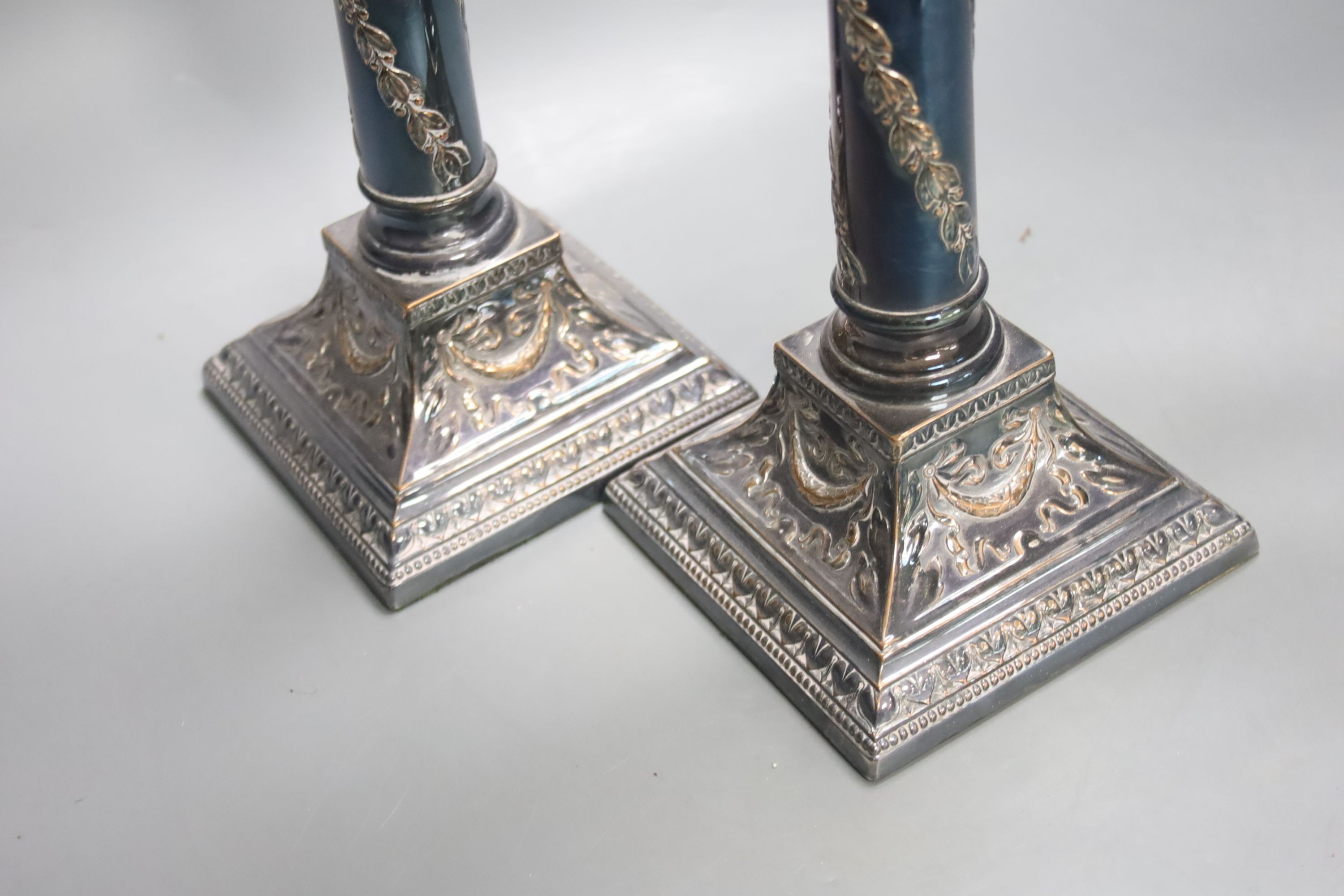 A pair of Georgian style plated two-branch three-light candelabra, height 53cm